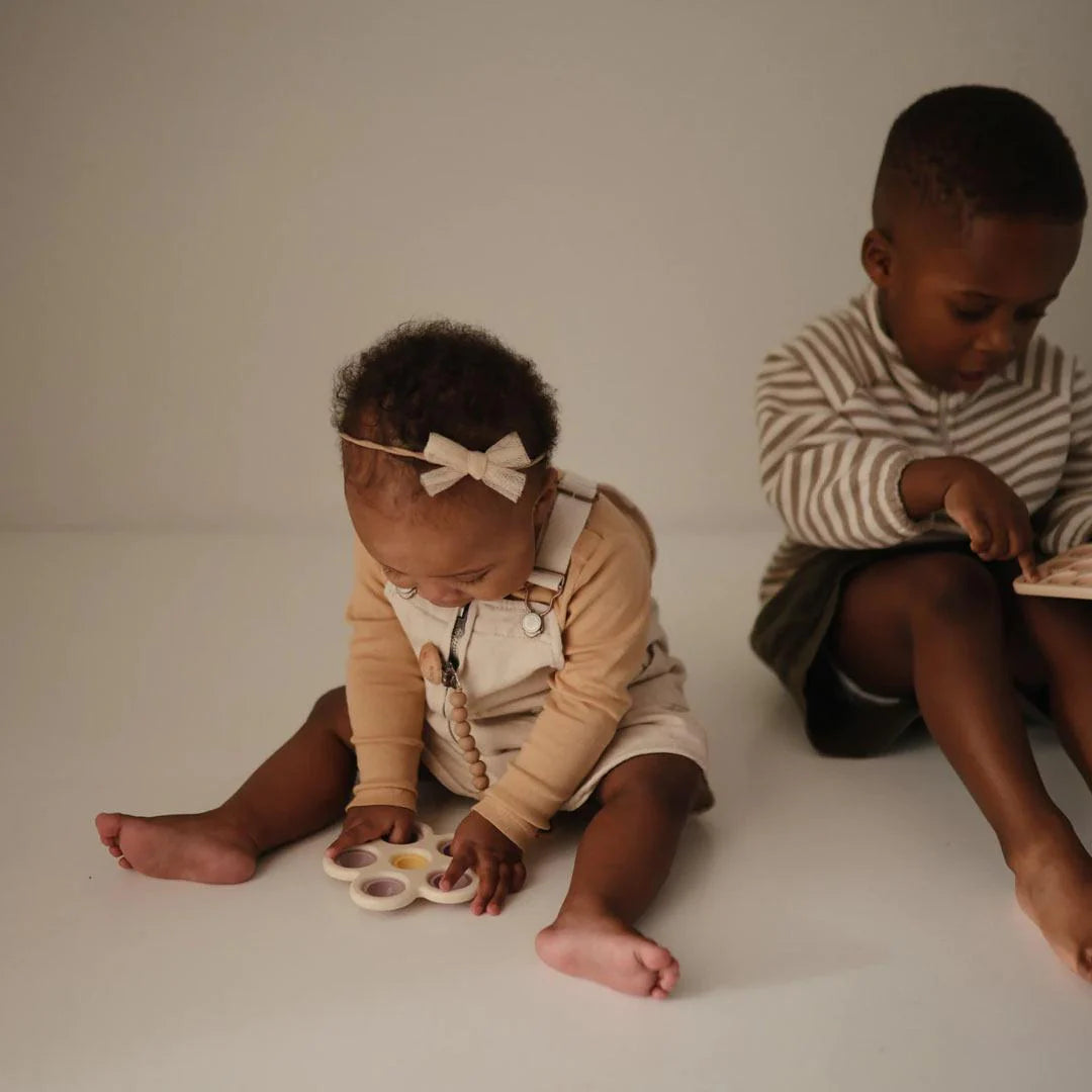 Mushie Painelulelu/Pop It Kukka Soft Lilac